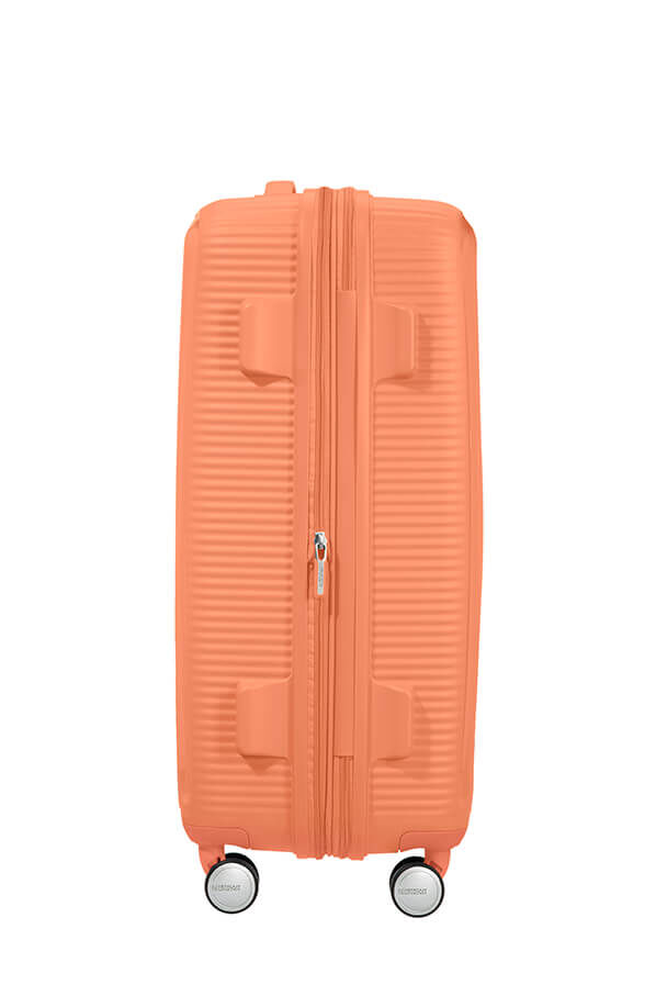 SoundBox Medium innsjekket | American Tourister Soundbox Spinner TSA Expandable 67cm  Cantaloupe
